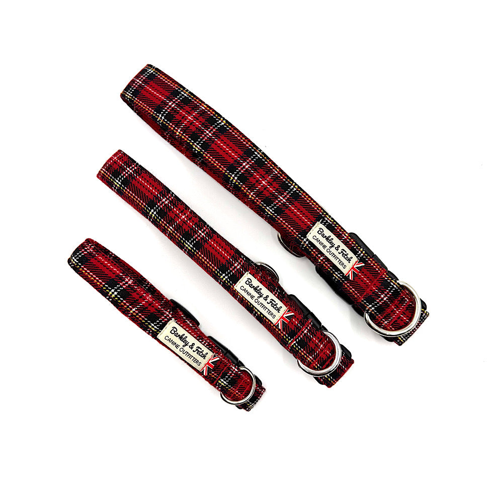 Red plaid dog collar and leash set on a white background