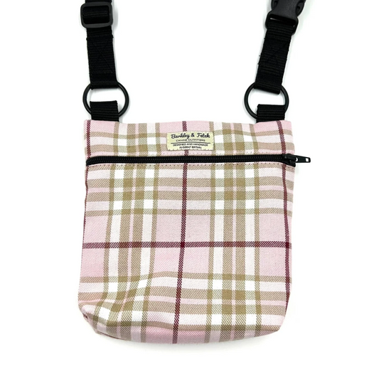 Plaid bag with black straps on a white background